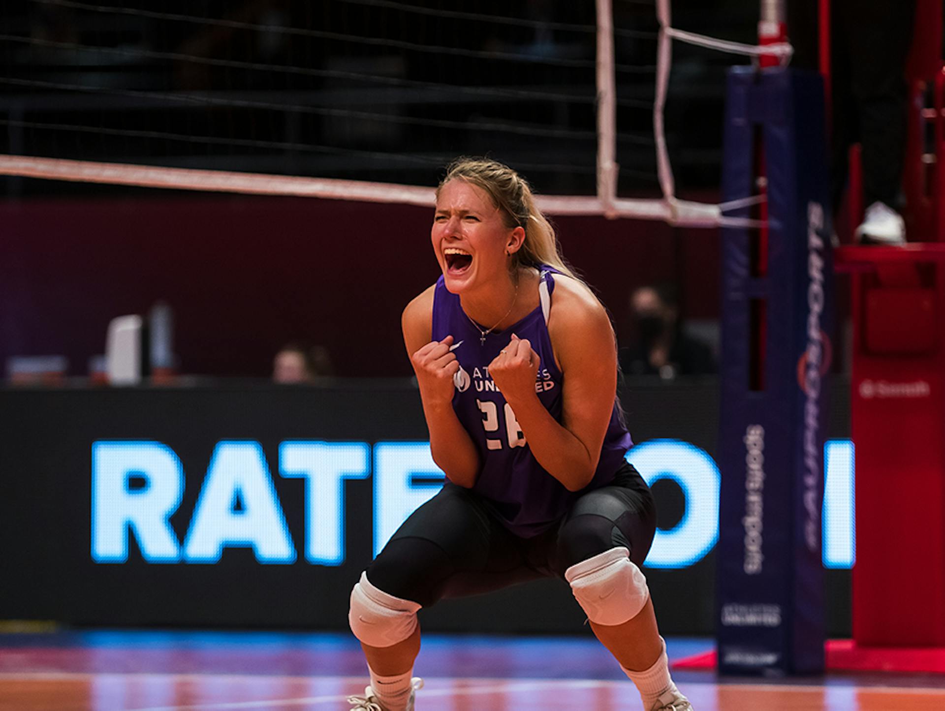 Brie King celebrates a point.