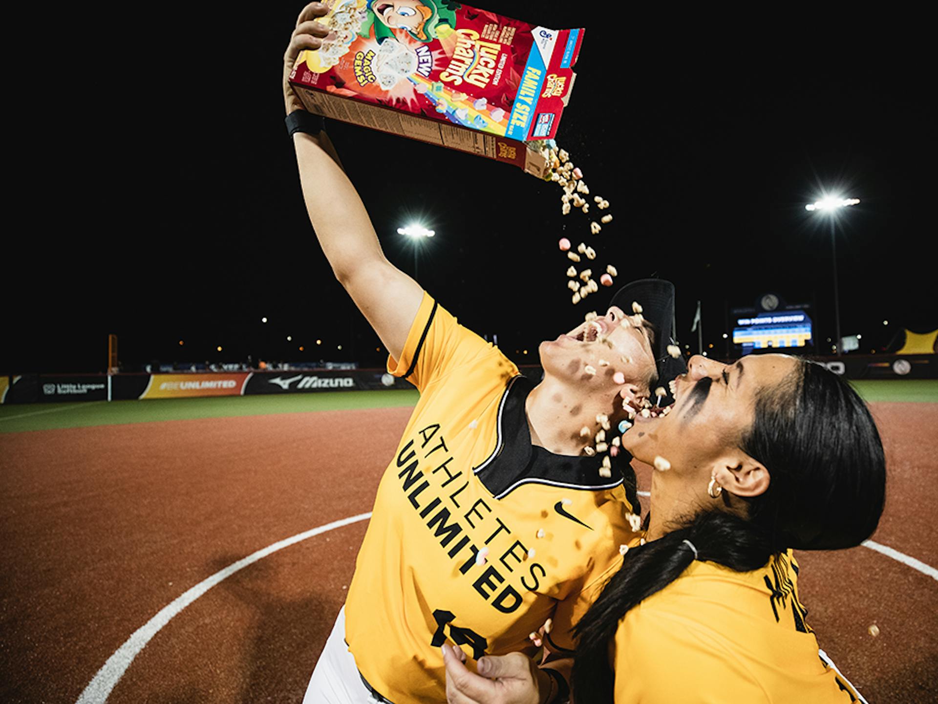 Dejah Mulipola and Hannah Flippen celebrate with Lucky Charms.