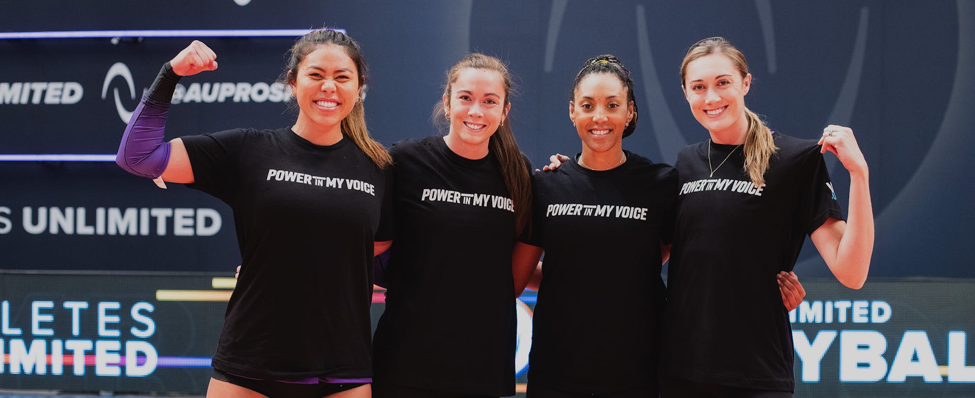Athletes show off their Power in My Voice t-shirts. From left to right: Kalei Mau, Val Nichol, Aury Cruz, and Molly McCage