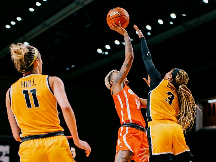 Courtney Williams goes for the game-winning lay up as Jordin Canada attempts to block the shot.