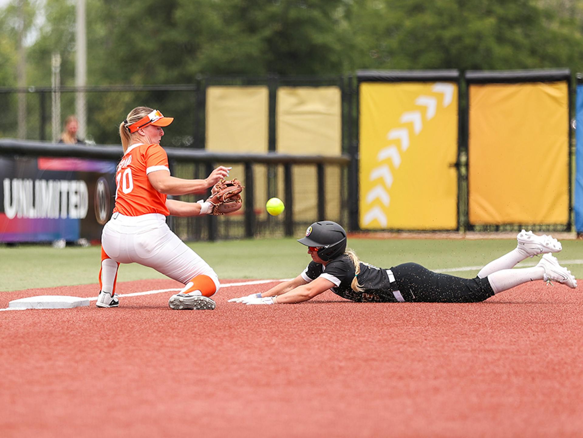 Aubrey Leach slides into third base.