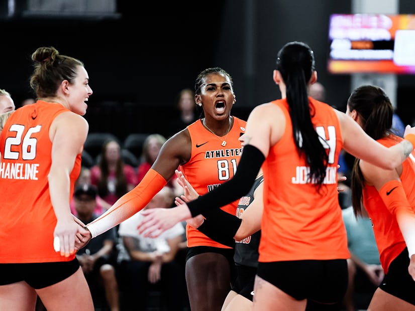 Team De La Cruz-Mejía celebrates a point