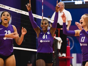 Bethania De La Cruz-Mejía celebrates with Kayla Caffey and Nootsara Tomkom