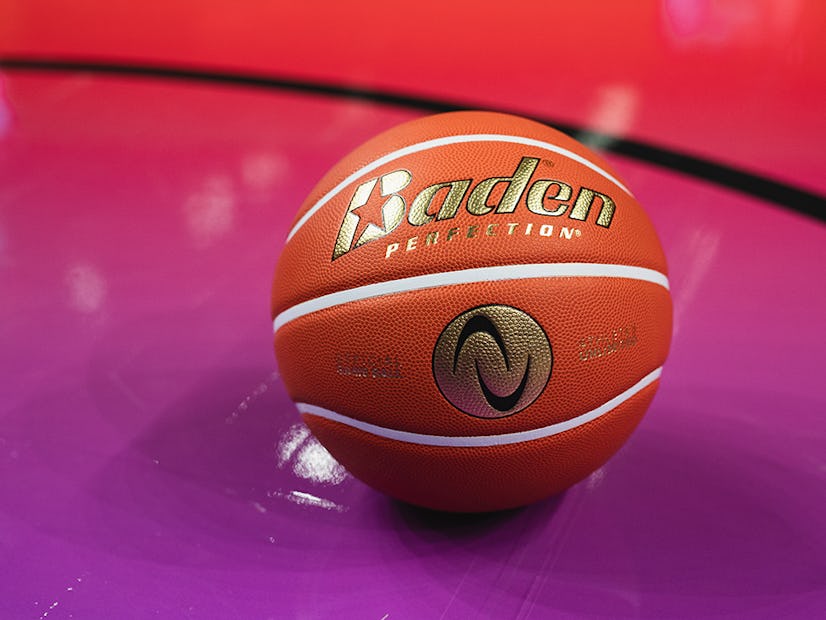 AU Pro Basketball Baden ball with gold detailing on the court